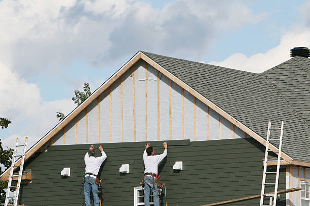 Professional Siding Replacement technician working in Wharton, OH